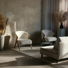 Przytulny salon w stylu japandi. Jasne fotele, sofa i dywan tworzą spokojną atmosferę. Suche trawy dodają naturalnego akcentu.